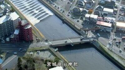 A tidal surge is seen in Sunaoshi River after tsunami advisories were issued following an earthquake in Tagajo, Miyagi prefecture in Japan on November 22, 2016, in a video grab image released by Miyagi Prefectural Police via Kyodo. Miyagi Prefectural Police / Kyodo via Reuters