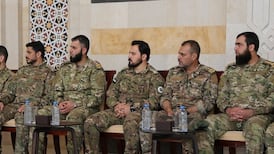 Sayf Boulad, centre, commander of the Hamzat Division militia group, is among those placed under UK sanctions. Photo: Sana