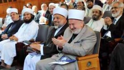 Mustafa Ceric, the grand mufti of Bosnia , right, reacts as Prince Ghazi of Jordan makes reference to him during a speech at the Yale conference.