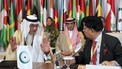 Dr Yousef Al Othaimeen, left, Secretary General of Organization of Islamic Cooperation, speaks to the chairman. Chris Whiteoak / The National