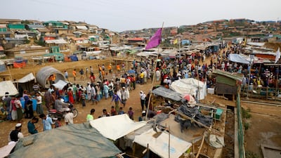 Rohingya refugees gather at a market inside a refugee camp in Cox's Bazar, Bangladesh. Reuters
