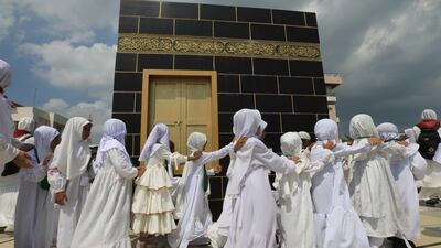 School pupils take part in early childhood Hajj pilgrimage education in Banda Aceh, Indonesia. EPA
