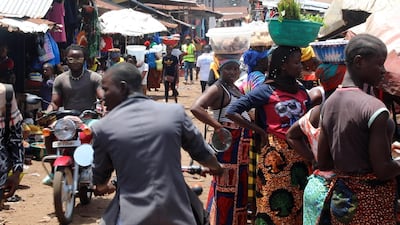 The bustling town of Tombo prepares for another busy day. Andy Scott / The National