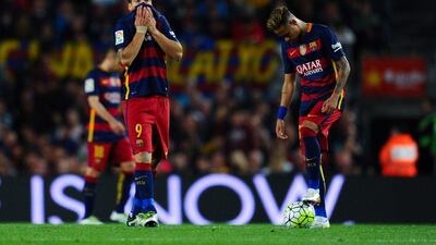 Luis Suarez (L) and Neymar of FC Barcelona look on dejected after Santi Mina of Valencia CF scored his team’s second goal during the La Liga match between FC Barcelona and Valencia CF at Camp Nou on April 17, 2016 in Barcelona, Spain. (Photo by David Ramos/Getty Images)