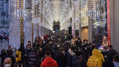 People crowd for Christmas shopping in Milan, Italy. EPA