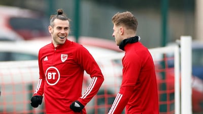 Spurs players Gareth Bale, left, and Joe Rodon training with Wales at the Vale Resort ahead of their World Cup qualifiers against Belgium and the Czech Republic, with a friendly against Mexico sandwiched in the middle. Reuters
