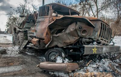 A damaged military vehicle sits in Kharkiv, Ukraine. AP