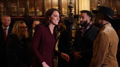 The Princess of Wales talks to guests. AFP