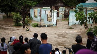 A home destroyed by flooding in Kampung Sewuresidential area in Solo, Central Java province, Indonesia on, June 19, 2016. Maulana Surya/Antara Foto via Reuters.