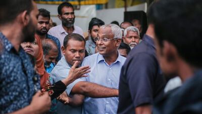 Maldives President-elect Ibrahim Mohamed Solih celebrating after his election win in Male. AFP/Ahmed Shurau