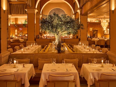 The restaurant has indoor and terrace seating, plus a private stretch of beach. Photo: Gigi Rigolatto