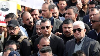 Head of the Popular Mobilization forces Faleh al-Fayyad (R) attends the funeral of the Iranian Major-General Qassem Soleimani, head of the elite Quds Force of the Revolutionary Guards, and the Iraqi militia commander Abu Mahdi al-Muhandis, who were killed in an air strike at Baghdad airport, in Baghdad. REUTERS