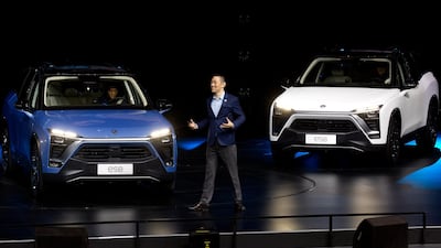 William Li, Founder and Chairman of Chinese automaker NIO launches the NIO ES8 electric SUV during an event held in Beijing, China, Saturday, Dec. 16, 2017. (AP Photo/Ng Han Guan)