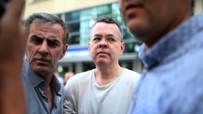In this July 25, 2018 photo, Andrew Craig Brunson, an evangelical pastor from Black Mountain, North Carolina, arrives at his house in Izmir, Turkey. AP