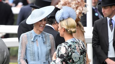 Catherine, Duchess of Cambridge, pictured talking to Zara Tindall, wore Elie Saab to Royal Ascot 2019. Reuters