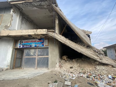 Some shops are operating from bombed buildings in Al Qusayr, which like many areas of Syria suffered significant damage throughout the war. Lizzie Porter / The National