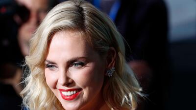 Cast member Charlize Theron poses on the red carpet as she arrives for the world premiere of her latest film Atomic Blonde in Berlin, Germany. Reuters/Fabrizio Bensch