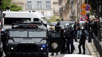 French police secure the area near the Iran consulate in Paris on April 19, after a man who had threatened to blow himself up was arrested. Reuters