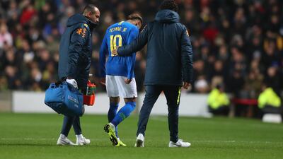 Neymar limps off during Brazil's friendly win over Cameroon. Getty Images