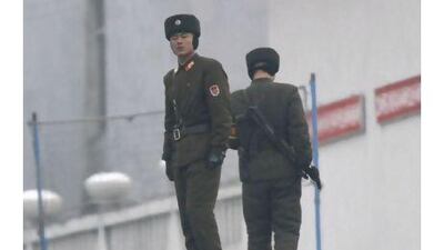 North Korean guards patrol the border with China along the Yalu River. One reader suggests that Pyongyang's provocative acts could be reined in if Beijing took a more active role.