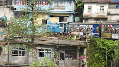 The 'toy trains' – so-called because of their dinky size – pass through settlements and hug cliff edges on the journey between Darjeeling and the city of Siliguri