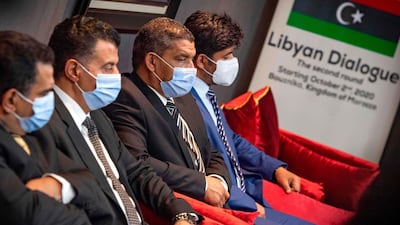 Representatives of Libya's rival administrations take part in a meeting in the coastal Moroccan town of Temara on October 4. AFP