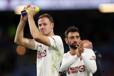 Jonny Evans made his 200th Manchester United appearance against Burnley, setting up the winner for Bruno Fernandes, right. Getty