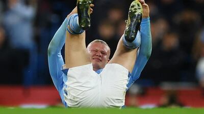 Manchester City's Erling Haaland after being felled by Fabian Schar. Reuters