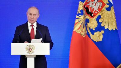 Russian President Vladimir Putin delivers a speech during a reception celebrating during National Unity Day in Moscow, Russia, Sunday, Nov. 4, 2018. AP