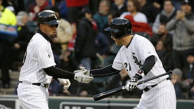Jose Abreu, left, and Todd Frazier, right, have carried the run load, with 19 and 18 runs batted in, respectively, through the Chicago White Sox's 19-10 start. Charles Rex Arbogast / AP Photo