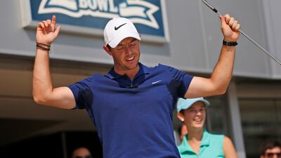 Rory McIlroy dances after hitting some golf balls at Yankee Stadium in New York, Tuesday, August 22, 2017. Seth Wenig / AP Photo