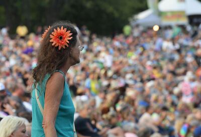 Guests attend a concert on the 50th anniversary of Woodstock. Angela Weiss / AFP