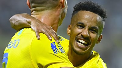 Cristiano Ronaldo celebrates scoring with Al Nassr teammate Abdulrahman Ghareeb. AFP