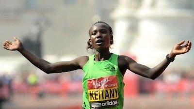Mary Keitany of Kenya crosses the finish line to win the women's 2011 London Marathon on April 17, 2011. Mary Keitany of Kenya won the women's London Marathon on Sunday in a time of 2:19.18, the fourth fastest time ever. AFP PHOTO/BEN STANSALL