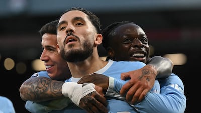 Rayan Cherki celebrates scoring Manchester City's third goal in their 3-0 Premier League win over Liverpool at Anfield on October 11, 2026. AFP