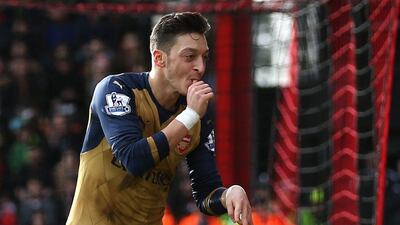 Mesut Ozil celebrates after scoring for Arsenal against Bournemouth on Sunday in the Premier League. Matthew Childs / Action Images / Reuters / February 7, 2016