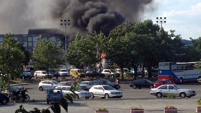 Smoke rising over Burgas airport after the suicide bomb attack on a tourist bus that killed five Israeli passengers and their driver. AFP