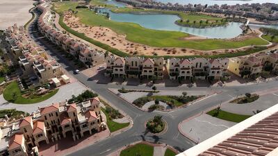 The townhouses, villas and golf course at Al Hamra village in Ras Al Khaimah. Pawan Singh / The National
