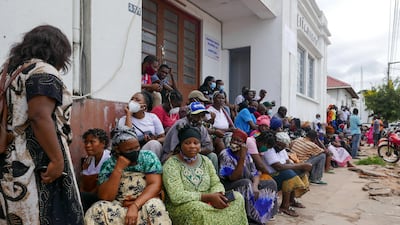 People await the arrival of more ships from Palma district with people fleeing attacks by rebel groups, in Pemba, Mozambique, 29 March 2021. EPA