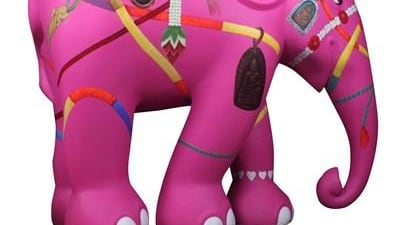 'Amulet' by Nopparuj Chenarn: "This lucky elephant is adorned by floral wreaths, various amulets and good luck charms from Thailand. May the elephant live a long and happy life!" Courtesy Elephant Parade