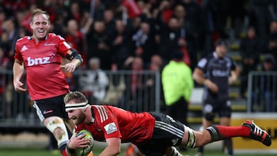 Kieran Read scores a try during Canterbury Crusaders' Super Rugby semi-final victory over Coastal Sharks on Saturday. Fiona Goodall / AFP / July 26, 2014