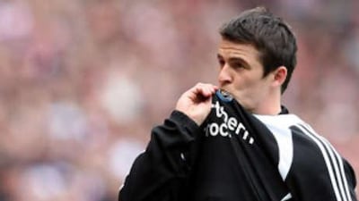 Newcastle United's Joey Barton reacts to the Sunderland fans after he had a coin thrown at him while he warmed up.