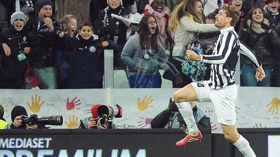 Juventus forward Fernando Llorente celebrates after scoring the winning goal against Udinese on Sunday. Alessandro Di Marco / EPA