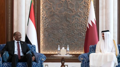 This handout picture released by Qatar's Amiri Diwan shows Qatar's Emir Sheikh Tamim bin Hamad al-Thani meeting with Sudan's army chief General Abdel Fattah al-Burhan in Doha on September 7, 2023. (Photo by Qatar Amiri Diwan / AFP) / RESTRICTED TO EDITORIAL USE - MANDATORY CREDIT "AFP PHOTO / QATAR AMIRI DIWAN" - NO MARKETING NO ADVERTISING CAMPAIGNS - DISTRIBUTED AS A SERVICE TO CLIENTS