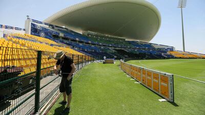 Broadcast crews have been working to adjust UAE's cricket stadiums, such as Zayed Cricket Stadium in Abu Dhabi, for the IPL, such as installing the cables for cameras. The opening match between Mumbai Indians vs Kolkata Knight Riders is April 16, 2014 at at Zayed Cricket Stadium in Abu Dhabi. Pawan Singh / The National