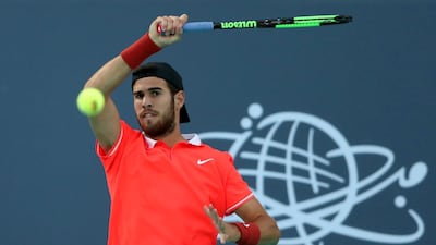 Russia's Karen Khachanov in action during the third-place match against Austria's Dominic Thiem at the Mubadala World Tennis Championship in Abu Dhabi on Saturday. Reuters