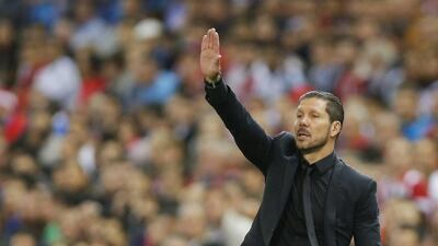 Atletico Madrid manager Diego Simeone directs his side during their 0-0 draw against Real Madrid in the Champions League on Tuesday night at the Vicente Calderon. Daniel Ochoa de Olza / AP