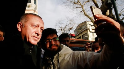 A handout photo made available by the Turkish President's press office shows Turkish President Recep Tayyip Erdogan meeting with the people in Istanbul, Turkey. EPA