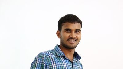 Sheikh Afroz, an electrician from Jharkhand, India, has his portrait taken. Pawan Singh / The National