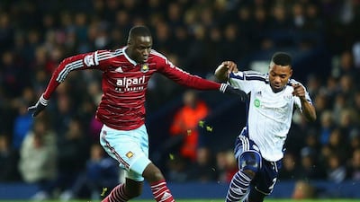 Cheikhou Kouyate of West Ham United holds off Stephane Sessegnon of West Bromwich Albion during his side's 2-1 Premier League win on Tuesday night at The Hawthorns. Matthew Lewis / Getty Images